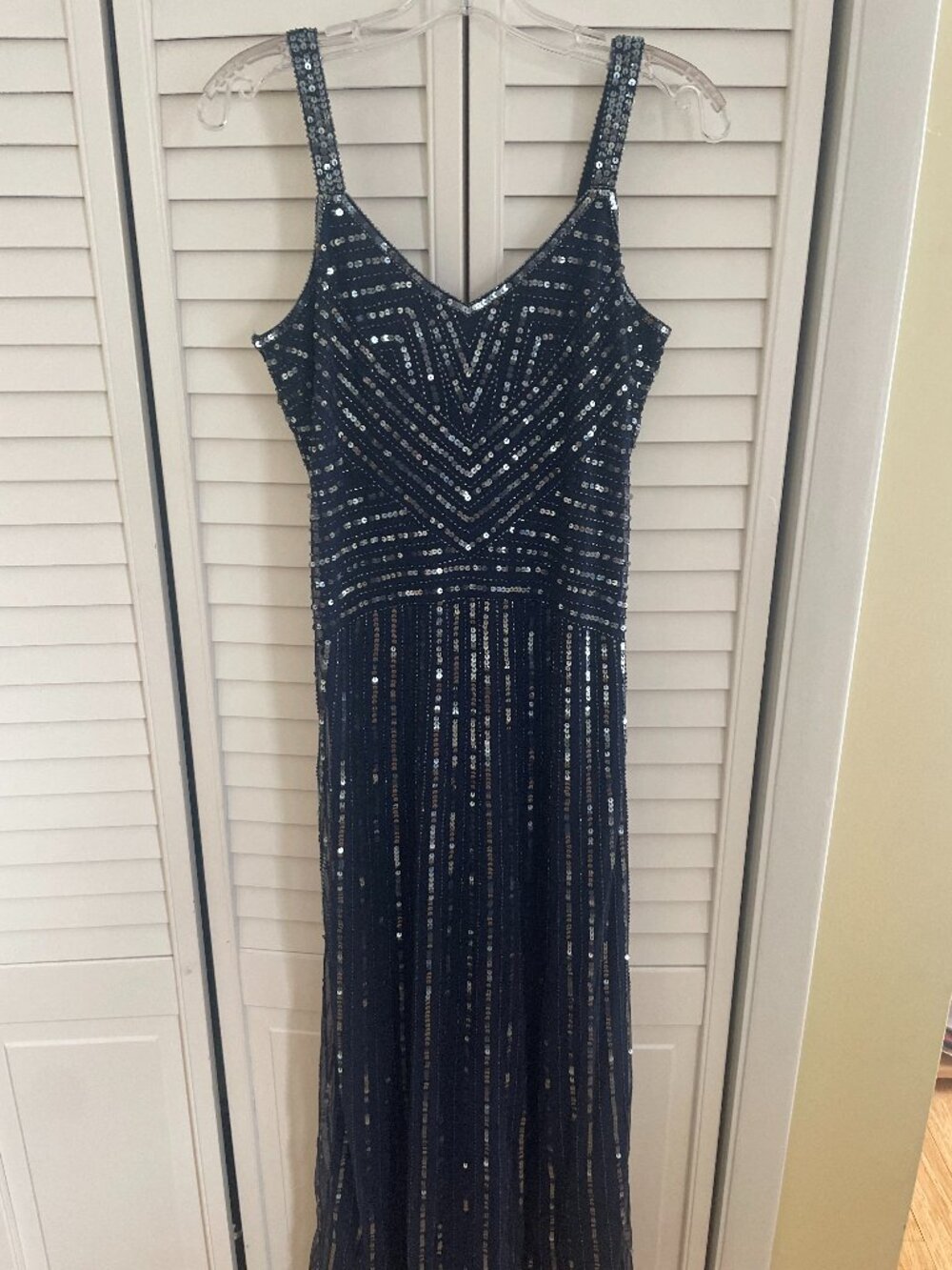 Beaded dark blue dress.